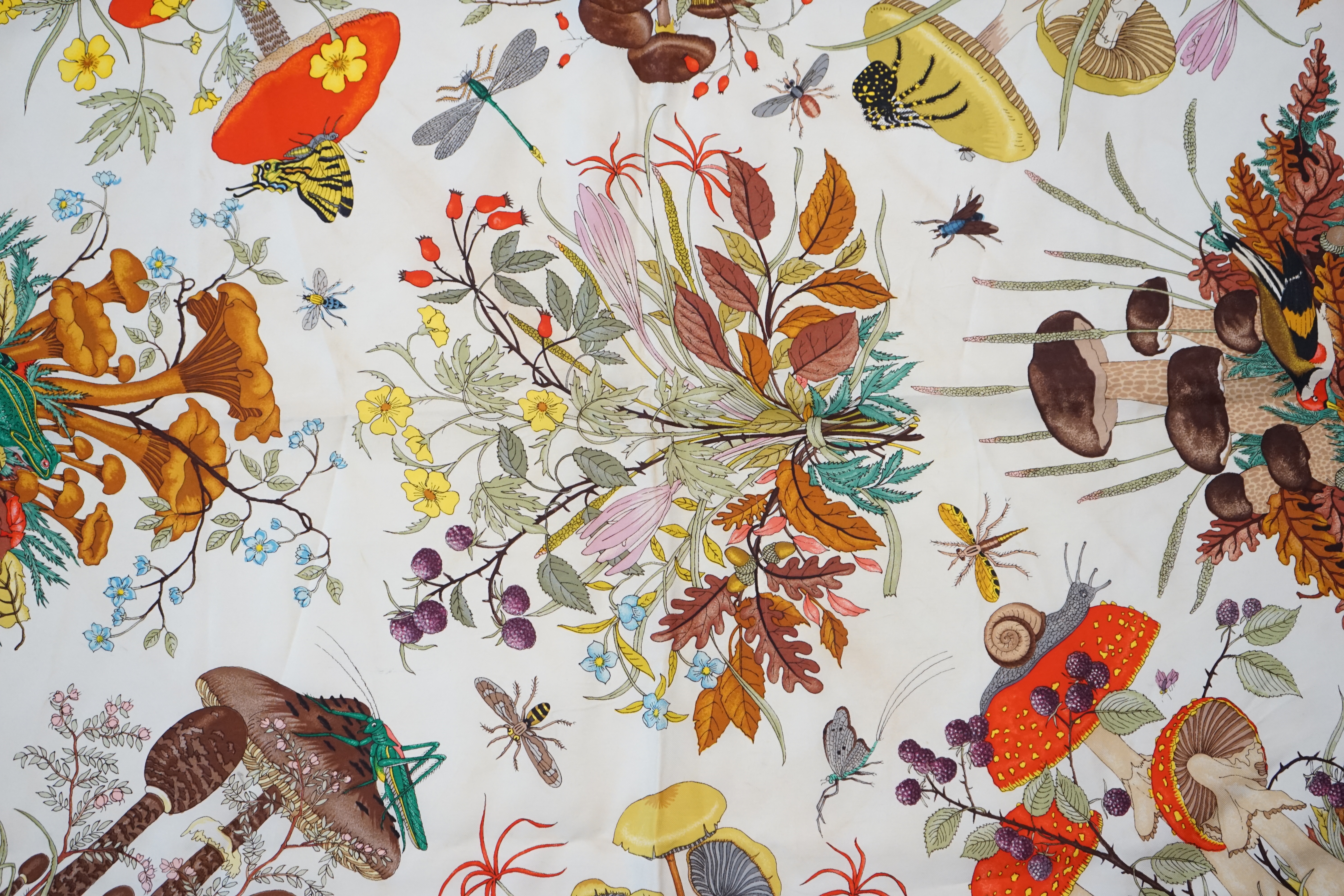 A Gucci vintage red floral silk scarf 'Funghi Mushrooms' by Vittorio Accornero, 87cm x 85cm